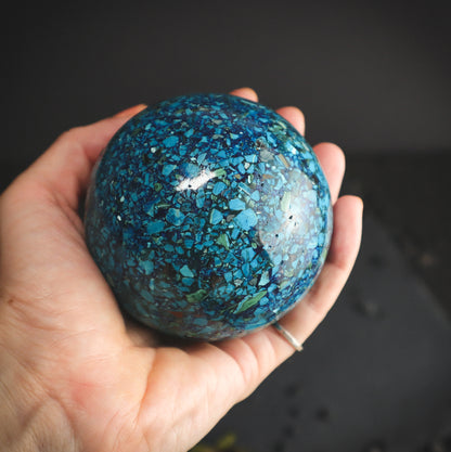 Crystal sphere with shades of blue and green cyan.