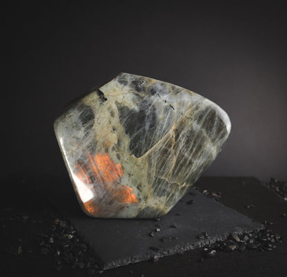 Labradorite mineral decoration with an orange shine.