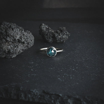 Deep blue crystal ring with recycled silver.