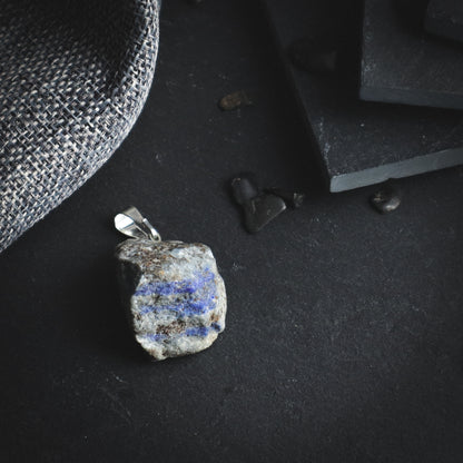 Blue raw mineral pendant.