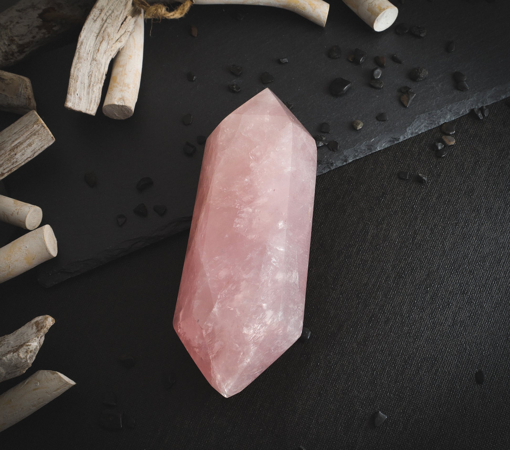 Rose quartz mineral with rainbows.