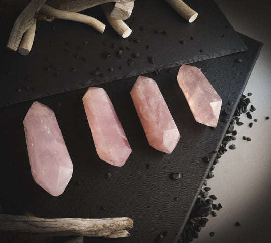 Double-terminated rose quartz stones.