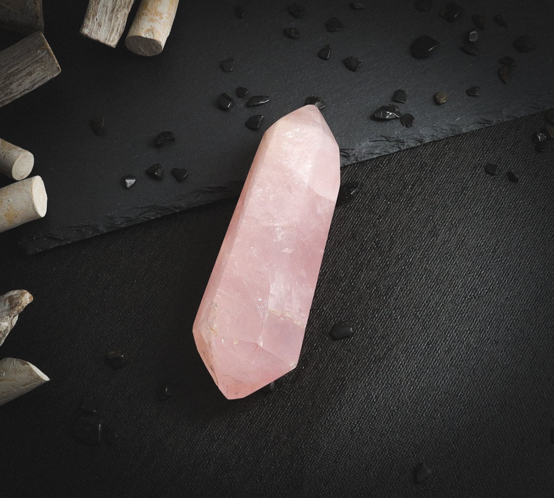 Rose quartz stone reflecting light.