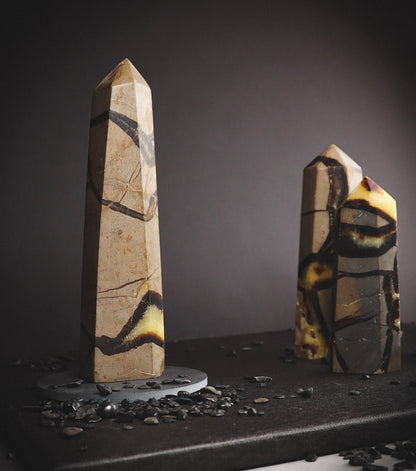 Multi-coloured mineral obelisk.