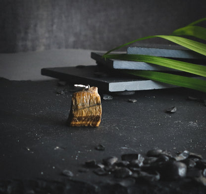 Raw tiger eye pendant.